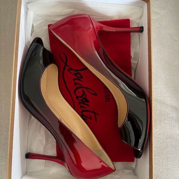 Striking Louboutin Red and Black High Heels with Peep-Toe Design - Picture 2 of 9